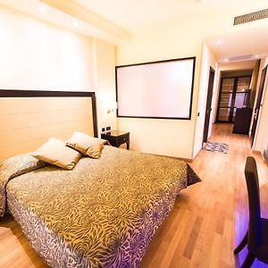 Kamer met een Queen Size Bed